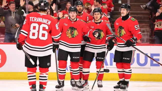 Connor Bedard #98 of the Chicago Blackhawks celebrates after scoring a goal against the Nashville Predators during the second period at the United Center on February 07, 2025 in Chicago, Illinois. (Photo by Michael Reaves/Getty Images)