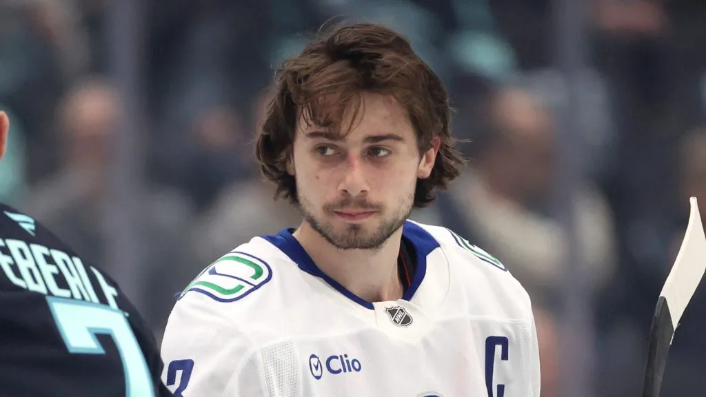 Quinn Hughes #43 of the Vancouver Canucks before the game at Climate Pledge Arena on March 01, 2025 in Seattle, Washington.