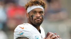 Tua Tagovailoa #1 of the Miami Dolphins warms up before a game against the Houston Texans at NRG Stadium on December 15, 2024 in Houston, Texas.