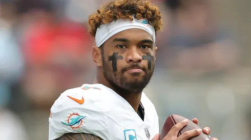 Tua Tagovailoa #1 of the Miami Dolphins warms up before a game against the Houston Texans at NRG Stadium on December 15, 2024 in Houston, Texas.