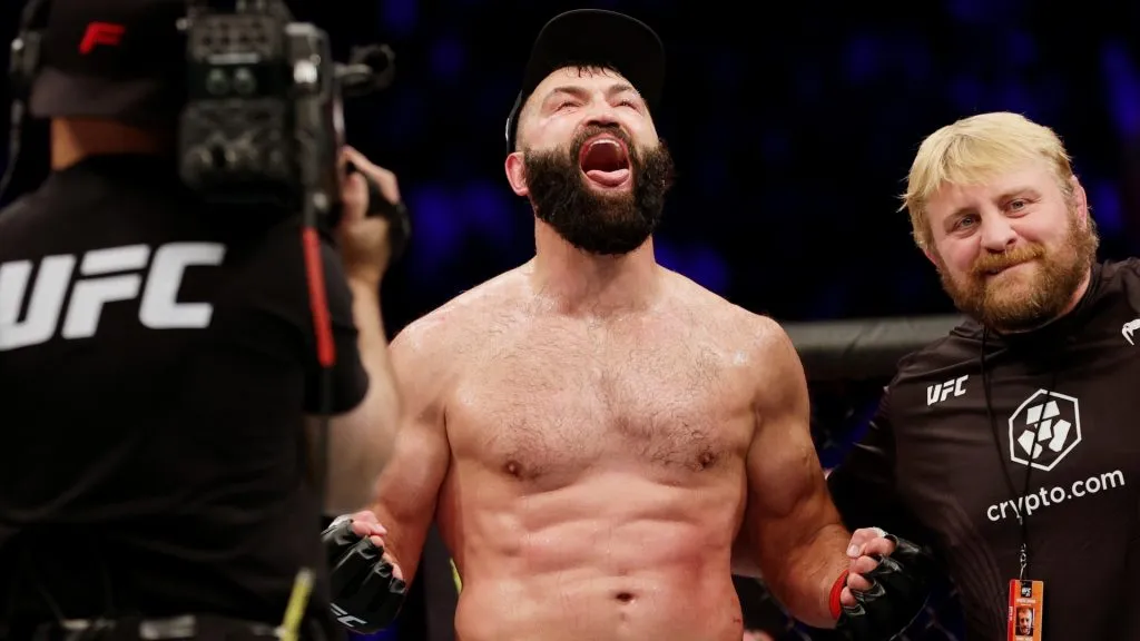Andrei Arlovski (C) of Belarus reacts after winning his heavyweight fight against Jared Vanderaa via split decision during UFC 271 at Toyota Center on February 12, 2022. (Source: Carmen Mandato/Getty Images)