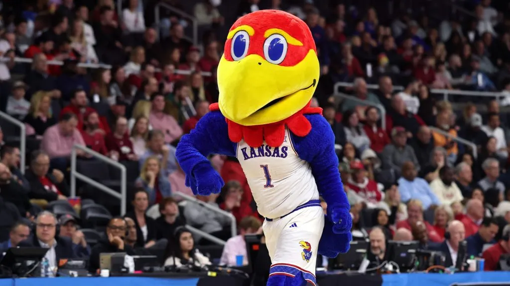 Kansas Jayhawks mascot performs during the first half in the first round of the NCAA Men’s Basketball Tournament against the Arkansas Razorbacks in 2025. (Source: Maddie Meyer/Getty Images)