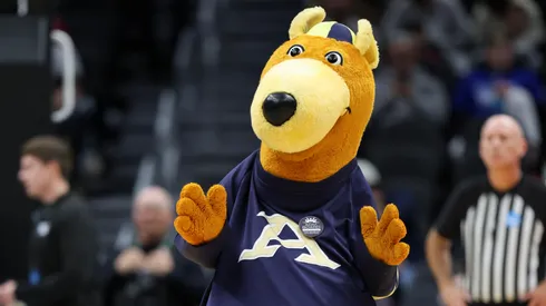 Zippy, the Akron Zips mascot, dances during the first half of a game against the Arizona Wildcats in the first round of the NCAA Men's Basketball Tournament in 2025.