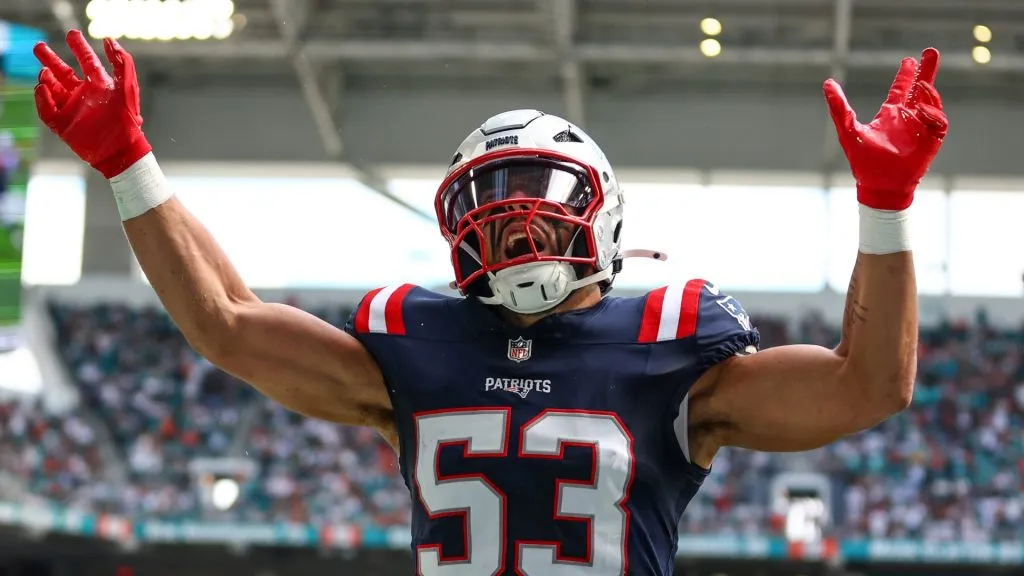 Christian Elliss #53 of the New England Patriots reacts after a pass break up against the Miami Dolphins during the second quarter at Hard Rock Stadium on November 24, 2024 in Miami Gardens, Florida.