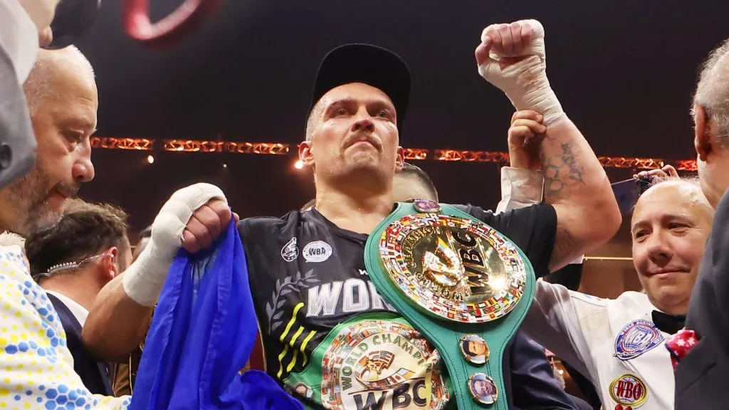 Oleksandr Usyk poses for a photo with the Undisputed Heavyweight title belt following victory over Tyson Fury (not pictured) in the IBF, WBA, WBC, WBO and Undisputed Heavyweight titles’ fight between Tyson Fury and Oleksandr Usyk at Kingdom Arena on May 18, 2024 in Riyadh, Saudi Arabia. (Photo by Richard Pelham/Getty Images)