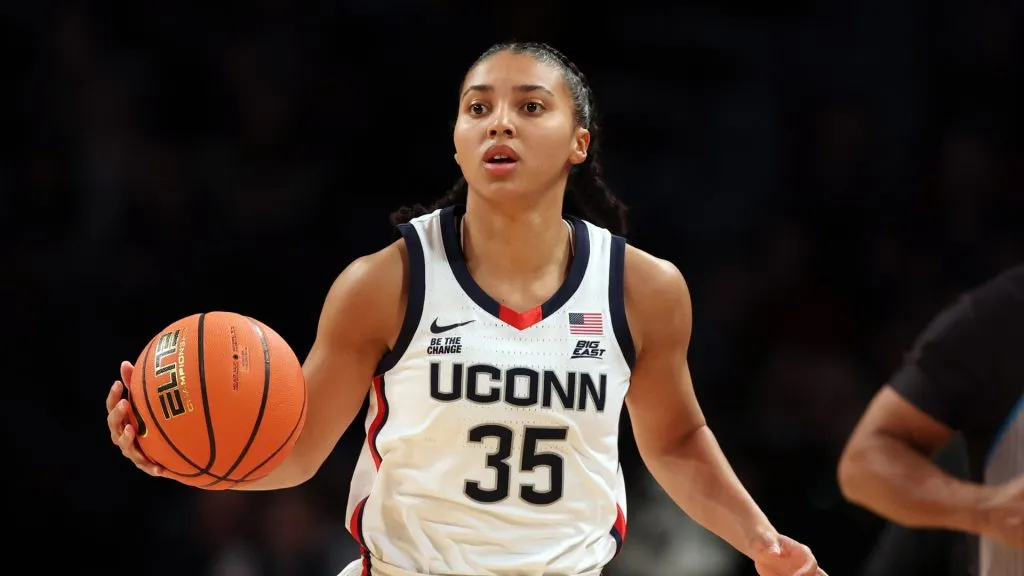Azzi Fudd #35 of the UConn Huskies dribbles during the first half against the Louisville Cardinals in the Shark Beauty Women’s Champions Classic at Barclays Center on December 07, 2024 in the Brooklyn borough of New York City.