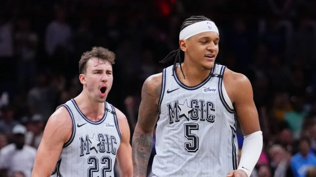Franz Wagner #22 and Paolo Banchero #5 of the Orlando Magic celebrate after scoring against the San Antonio Spurs