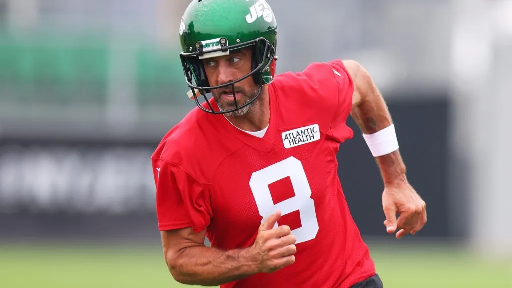 Aaron Rodgers #8 of the New York Jets run drills during training camp at Atlantic Health Jets Training Center on July 20, 2023. (Source: Mike Stobe/Getty Images)