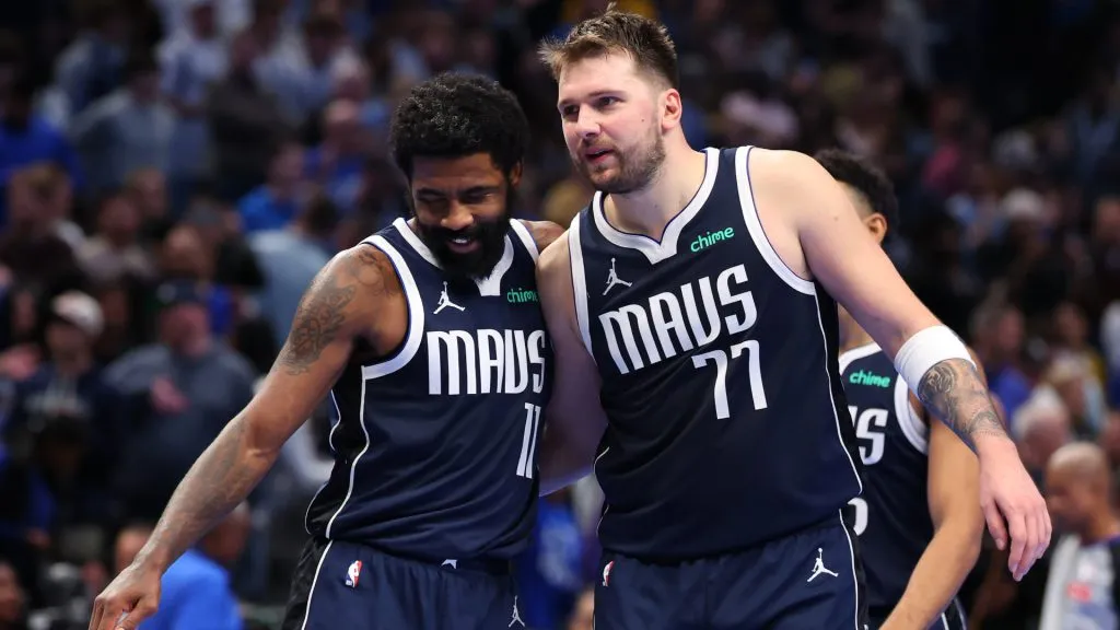 Kyrie Irving #11 and Luka Doncic #77 of the Dallas Mavericks celebrate after scoring during the Emirates NBA Cup. (Sam Hodde/Getty Images)