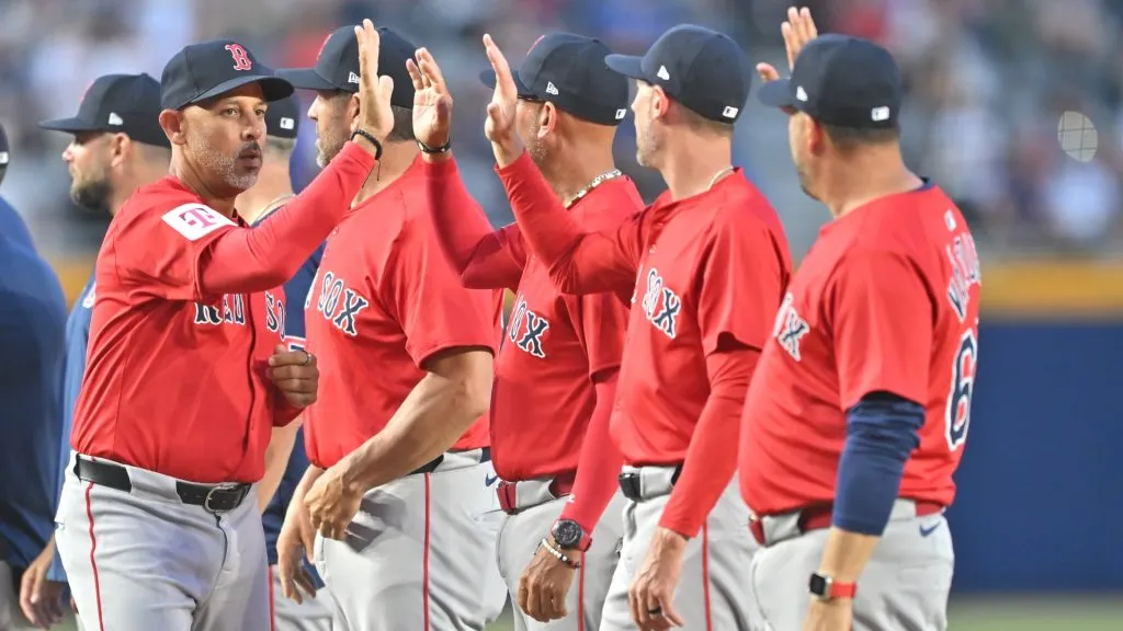 Manager Alex Cora (L) of the Boston Red Sox greets his players prior to the MLB Monterrey Series between the Boston Red Sox and Sultanes de Monterrey at estadio Mobil Super on March 24, 2025 in Monterrey, Mexico. (Photo by Azael Rodriguez/Getty Images)