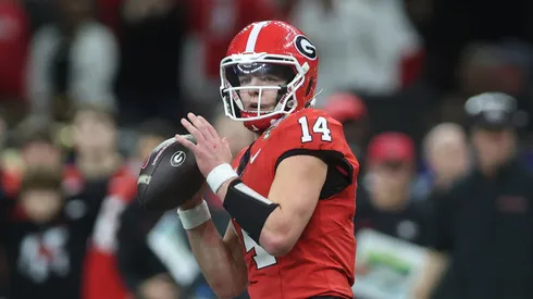 Gunner Stockton #14 of the Georgia Bulldogs looks to pass during the fourth quarter against the Notre Dame Fighting Irish during the 91st Allstate Sugar Bowl at Caesars Superdome on January 02, 2025 in New Orleans, Louisiana.