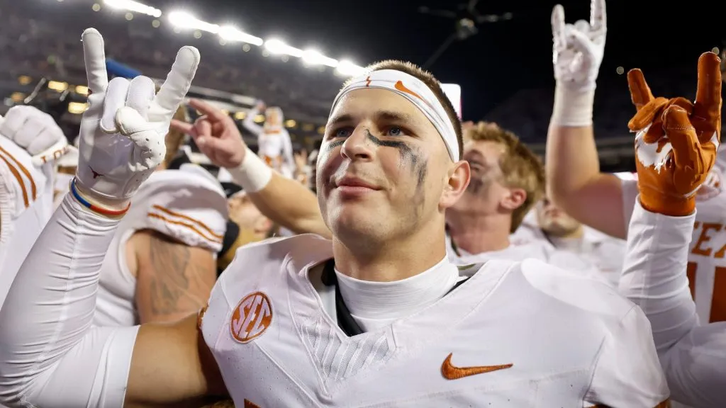 Michael Taaffe #16 of the Texas Longhorns celebrates with teammates after the game against the Texas A&amp;M Aggies at Kyle Field on November 30, 2024 in College Station, Texas.