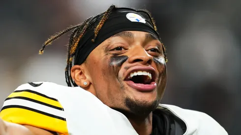 Justin Fields #2 of the Pittsburgh Steelers celebrates as he runs offthe field after the Steelers defeated the Las Vegas Raiders, 32-13, at Allegiant Stadium on October 13, 2024 in Las Vegas, Nevada.