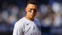 Aaron Judge #99 of the New York Yankees looks on after striking out in the third inning against the Milwaukee Brewers on Opening Day at Yankee Stadium on March 27, 2025 in New York City.