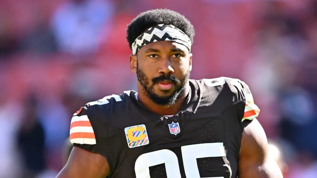 Myles Garrett #95 of the Cleveland Browns looks on during warmups before a game against the Cincinnati Bengals at Huntington Bank Field on October 20, 2024 in Cleveland, Ohio.