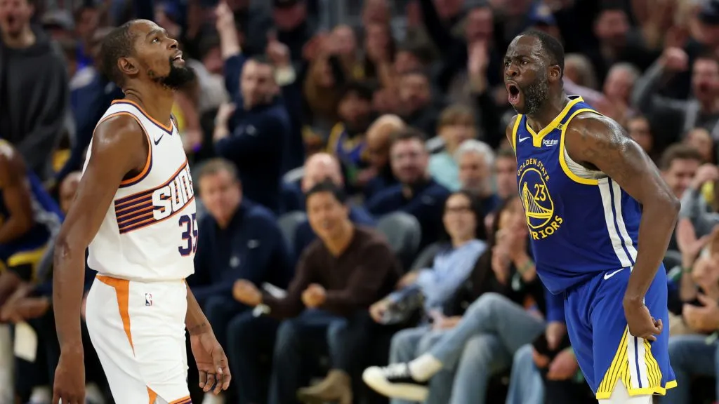 Draymond Green #23 reacts after he made a three-point basket over Kevin Durant #35 in the first half at Chase Center. (Ezra Shaw/Getty Images)