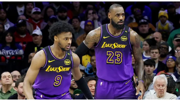 Bronny James #9 stands by LeBron James #23 of the Los Angeles Lakers during the 2024-25 season
