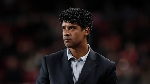 Coach Frank Rijkaard of Barcelona follows his players during the La Liga match between Barcelona and Getafe