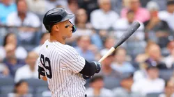 Aaron Judge #99 of the New York Yankees hits a grand slam home run in the third inning against the Milwaukee Brewers at Yankee Stadium on March 29, 2025 in New York City.