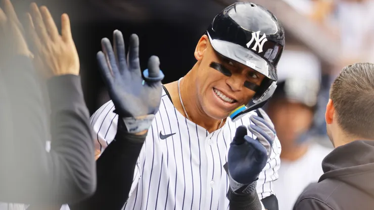 Aaron Judge #99 of the New York Yankees celebrates after hitting a two run home run in the fourth inning against the Milwaukee Brewers at Yankee Stadium on March 29, 2025 in New York City.