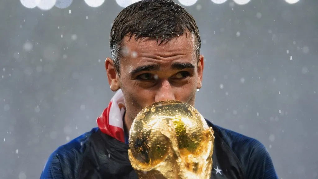 Antoine Griezmann of France celebrates with the World Cup Trophy following his sides victory in the 2018 FIFA World Cup Final between France and Croatia