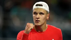 Jakub Mensik of Czechia celebrates winning the first set against Taylor Fritz during their Semi Final match on Day 11 of the Miami Open.