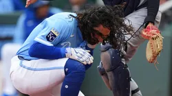 Jonathan India #6 of the Kansas City Royals is hit by a Cleveland Guardians during the ninth inning at Kauffman Stadium on March 30, 2025 in Kansas City, Missouri.