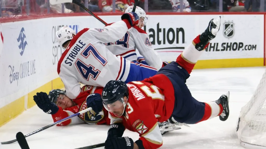 Brad Marchand #63 of the Florida Panthers is tripped up during the second period against the Montreal Canadiens at Amerant Bank Arena on March 30, 2025 in Sunrise, Florida.