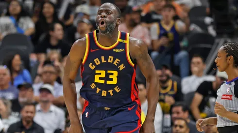 Draymond Green #23 of the Golden State Warriors reacts after hitting a three against the San Antonio Spurs in the second half at Frost Bank Center on March 30, 2025 in San Antonio, Texas.