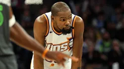 Kevin Durant #35 of the Phoenix Suns looks on against the Minnesota Timberwolves in the third quarter at Target Center on March 28, 2025 in Minneapolis, Minnesota. The Timberwolves defeated the Suns 124-109.