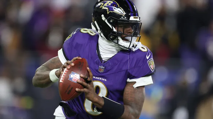 Lamar Jackson #8 of the Baltimore Ravens steps back to pass during the third quarter against the Pittsburgh Steelers during the AFC Wild Card Playoff at M&T Bank Stadium on January 11, 2025 in Baltimore, Maryland.