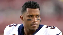 Russell Wilson looks on from the sidelines of a preseason game against the San Francisco 49ers during the fourth quarter at Levi's Stadium on August 19, 2023 in Santa Clara, California.