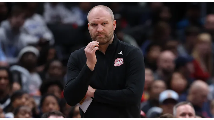 Head coach Taylor Jenkins of the Memphis Grizzlies looks on against the Washington Wizards during the first half at Capital One Arena on December 8, 2024 in Washington, DC.
