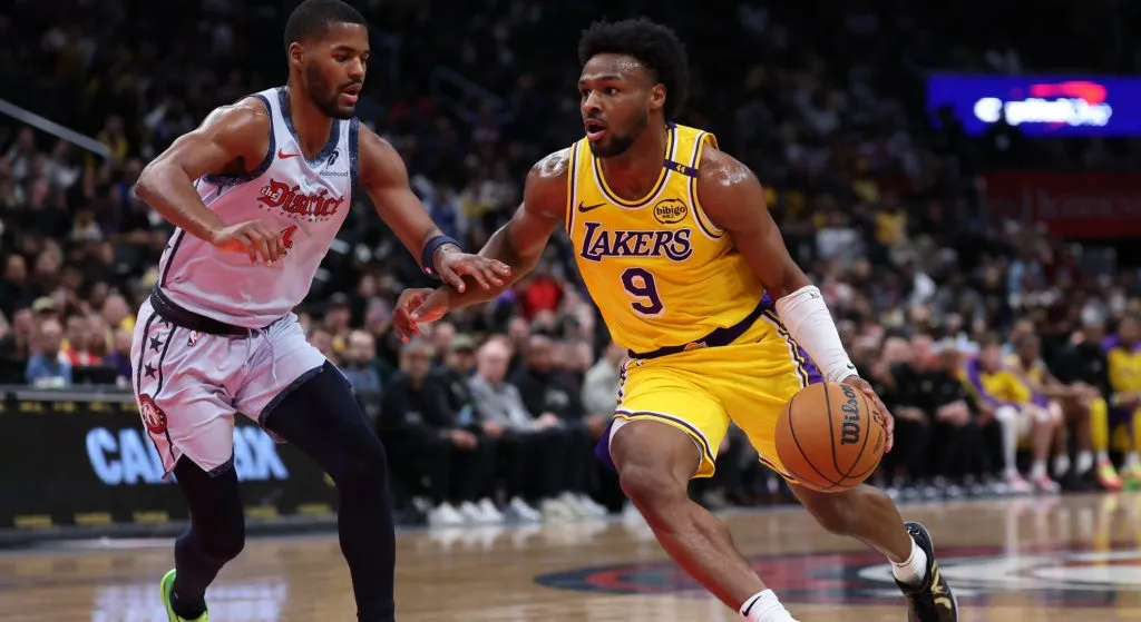 Bronny James #9 of the Los Angeles Lakers controls the ball against the Washington Wizards during the second half at Capital One Arena on January 30, 2025 in Washington, DC.