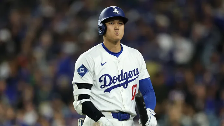 Shohei Ohtani #17 of the Los Angeles Dodgers reacts after striking out during the fourth inning against the Atlanta Braves at Dodger Stadium on March 31, 2025 in Los Angeles, California.