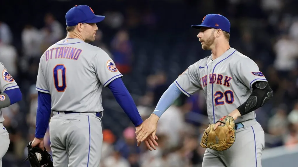 Adam Ottavino #0 and Pete Alonso #20 of the New York Mets celebrate after defeating the New York Yankees at Yankee Stadium on July 25, 2023 in the Bronx borough of New York City. (Photo by Jim McIsaac/Getty Images)