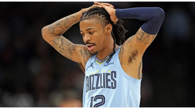 Ja Morant #12 of the Memphis Grizzlies reacts during the first half against the Phoenix Suns at FedExForum on March 10, 2025 in Memphis, Tennessee.