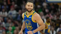 Stephen Curry #30 of the Golden State Warriors reacts after making a three-point shot against the Los Angeles Lakers during the first half at Chase Center on December 25, 2024.