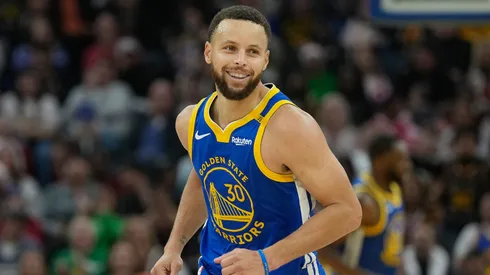Stephen Curry #30 of the Golden State Warriors reacts after making a three-point shot against the Los Angeles Lakers during the first half at Chase Center on December 25, 2024.