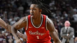 Meechie Johnson Jr. #1 of the Ohio State Buckeyes drives toward the basket at Zhuric Phelps #1 of the Texas A&M Aggies defends during the second half at Reed Arena on November 15, 2024 in College Station, Texas.