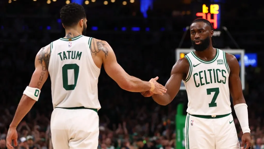 Jaylen Brown #7 of the Boston Celtics celebrates with Jayson Tatum #0 during overtime against the Indiana Pacers in Game One of the Eastern Conference Finals at TD Garden on May 21, 2024. (Source:Maddie Meyer/Getty Images)