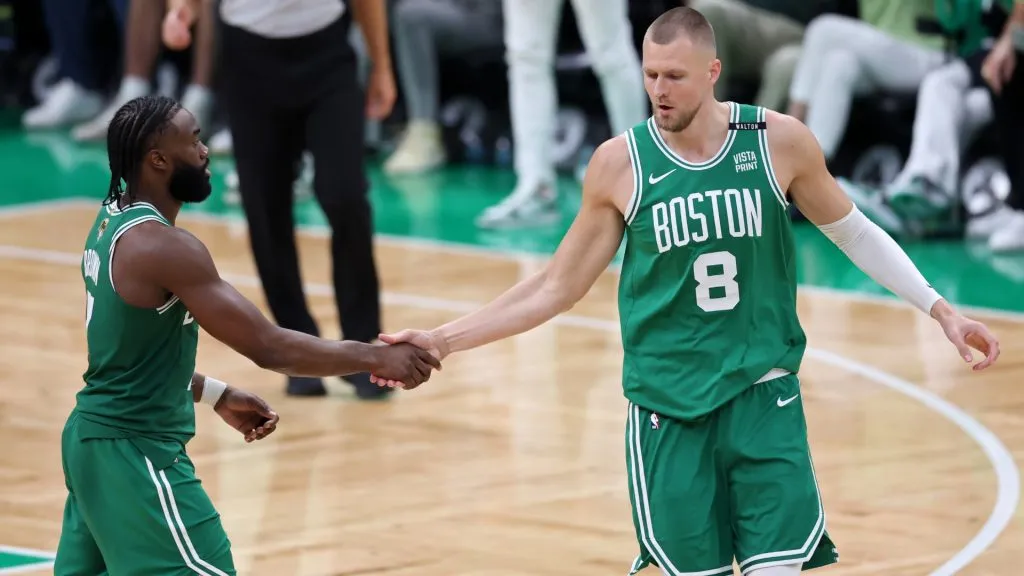 Jaylen Brown #7 and Kristaps Porzingis #8 of the Boston Celtics celebrate after a pladuring the fourth quarter of Game Five of the 2024 NBA Finals. (Source: Adam Glanzman/Getty Images)