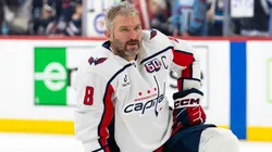 Alex Ovechkin #8 of the Washington Capitals stretches during warm-up as they take on the Winnipeg Jets at Canada Life Centre on March 25, 2025.