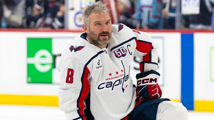 Alex Ovechkin #8 of the Washington Capitals stretches during warm-up as they take on the Winnipeg Jets at Canada Life Centre on March 25, 2025.