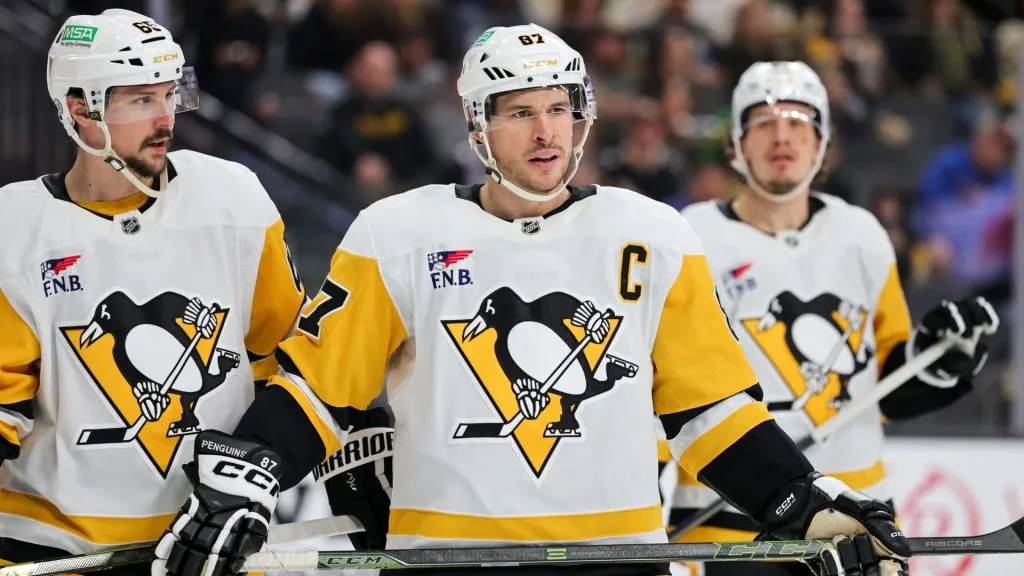 Erik Karlsson #65 and Sidney Crosby #87 of the Pittsburgh Penguins wait for a faceoff in the second period of a game against the Vegas Golden Knights on March 07, 2025. (Source: Ethan Miller/Getty Images)