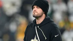 Derek Carr #4 of the New Orleans Saints looks on before the game against the Green Bay Packers at Lambeau Field on December 23, 2024 in Green Bay, Wisconsin.