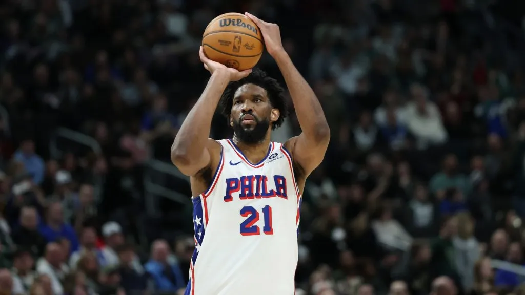 Joel Embiid #21 of the Philadelphia 76ers takes a three point shot during a game against the Milwaukee Bucks at Fiserv Forum. (Stacy Revere/Getty Images)