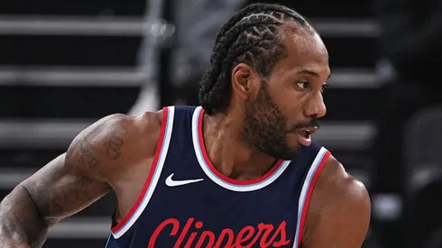 Kawhi Leonard #2 of the LA Clippers controls the ball against Bruce Brown #00 of the New Orleans Pelicans during the first half of a game at Intuit Dome on April 02, 2025 in Inglewood, California.