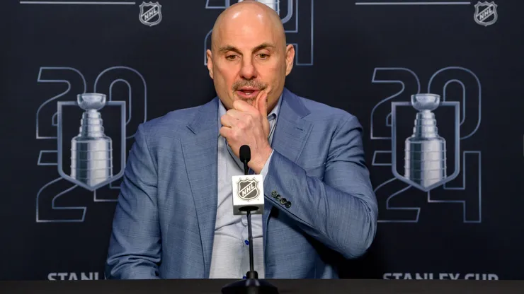 : Rick Tocchet head coach of the Vancouver Canucks speaks to the press after losing to the Edmonton Oilers in Game Seven of the Second Round of the 2024 Stanley Cup Playoffs.