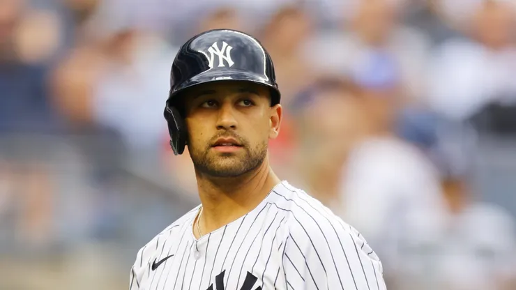J.C. Escarra #25 of the New York Yankees walks back to the dugout after striking out in his MLB debut in the seventh inning against the Milwaukee Brewers at Yankee Stadium on March 29, 2025 in New York City.